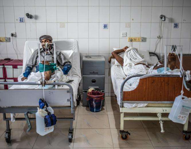 Patients in their hospital beds at MSF's Aden Trauma Hospital in Yemen.